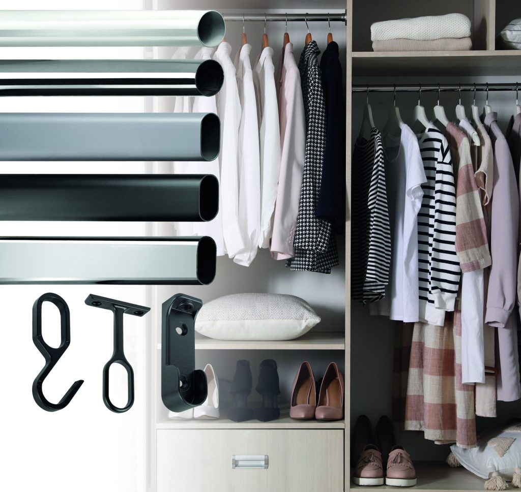 Wardrobe closet with different stylish clothes, shoes and home stuff in room